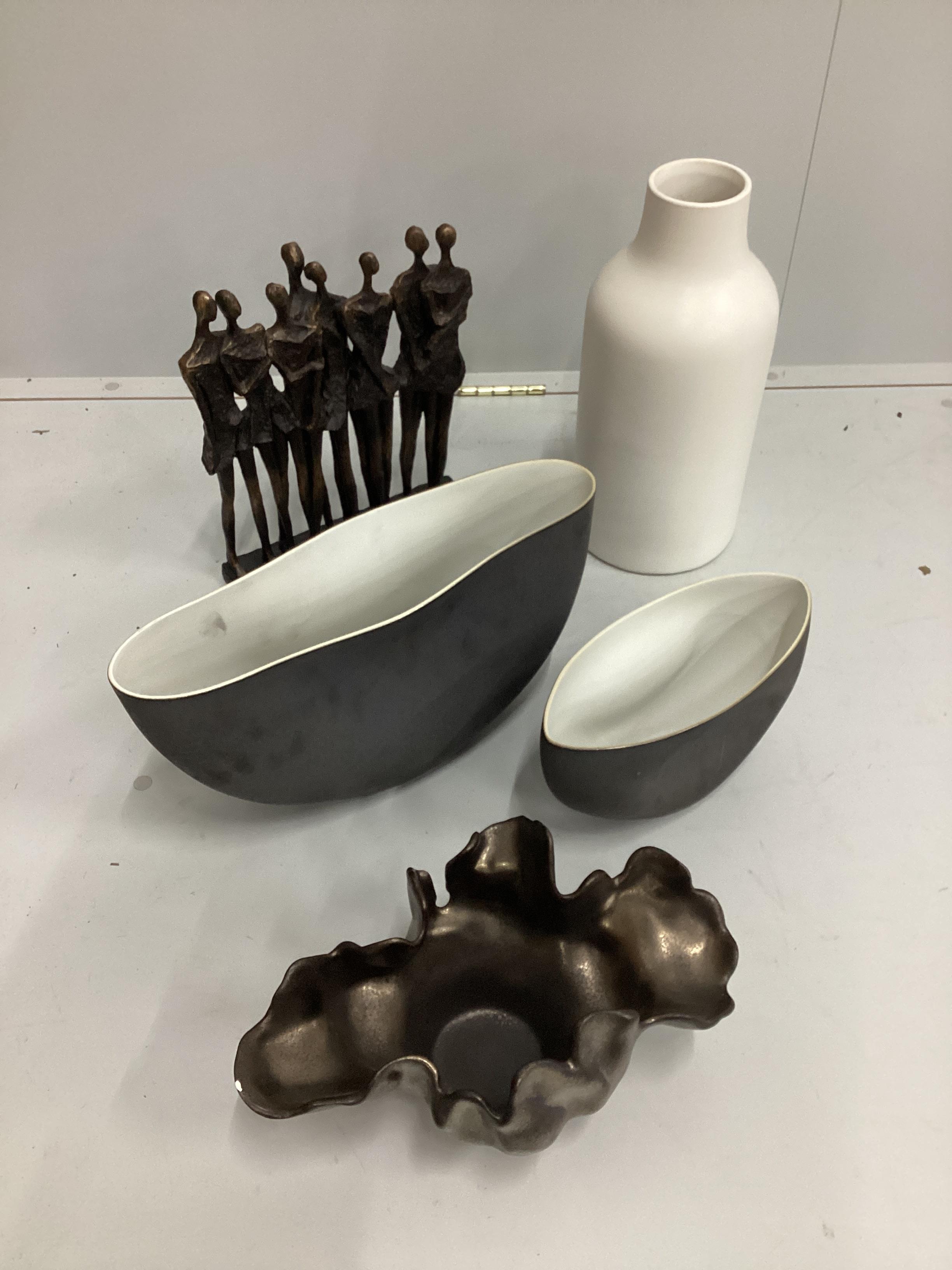 A contemporary pottery vase, three dishes and a bronzed resin group, largest height 38cm